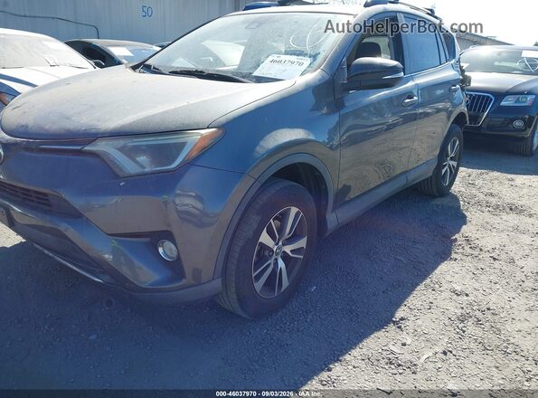JTMWFREV3JD128423 2018 TOYOTA RAV4 Gray Front left