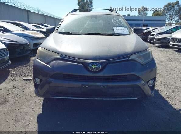 JTMWFREV3JD128423 2018 TOYOTA RAV4 Gray Rear interior view