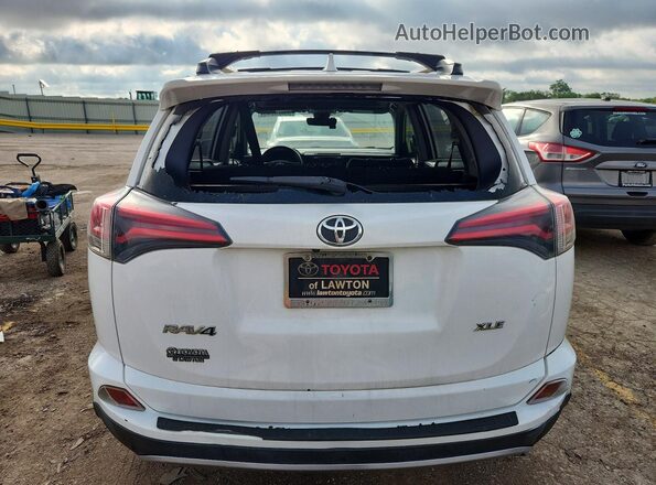 JTMWFREV5JD128634 2018 TOYOTA RAV4 White Vista trasera