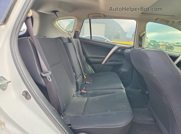 JTMWFREV5JD128634 2018 TOYOTA RAV4 White Vista interior trasera