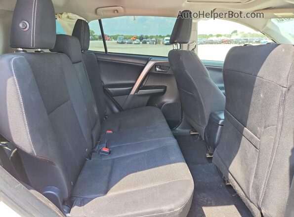 JTMWFREV6JJ150286 2018 TOYOTA RAV4 White Vista interior trasera