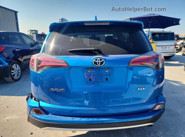 JTMWFREV6JJ724367 2018 TOYOTA RAV4 Синий Вид сзади