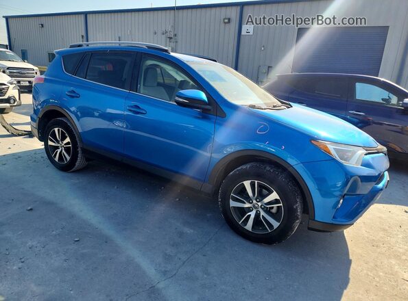 JTMWFREV6JJ724367 2018 TOYOTA RAV4 Синий Передняя правая четверть