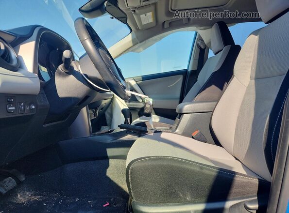 JTMWFREV6JJ724367 2018 TOYOTA RAV4 Синий Вид салона спереди