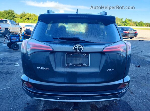 JTMWFREV8JJ157403 2018 TOYOTA RAV4 Угольный Вид сзади