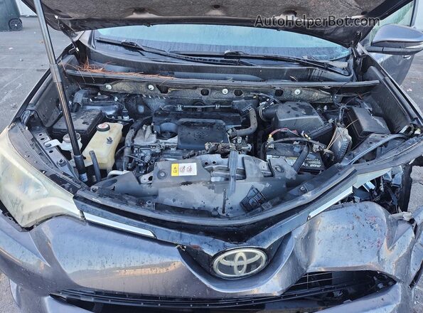 JTMWFREV8JJ157403 2018 TOYOTA RAV4 Угольный Вид задней части салона