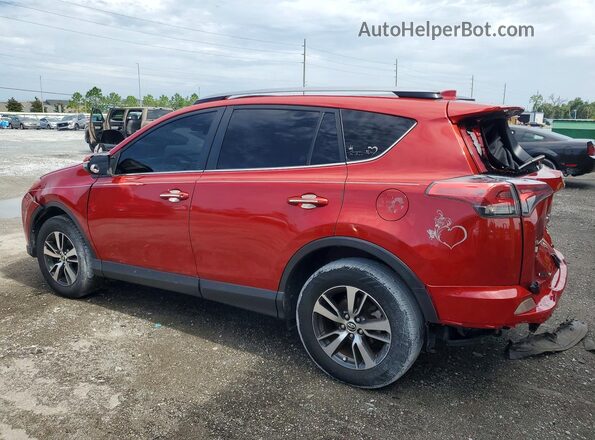JTMWFREV9HJ142693 2017 TOYOTA RAV4 Red Rear left