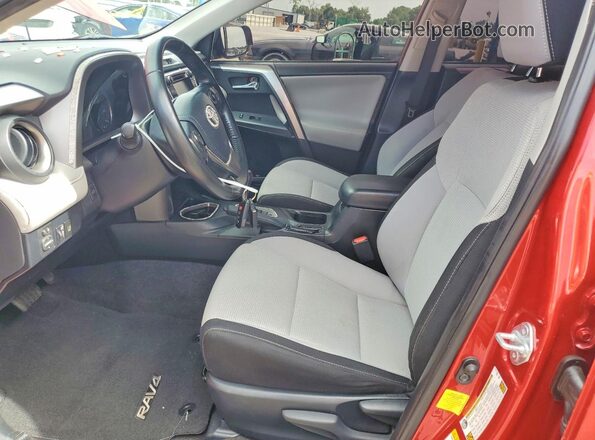 JTMWFREV9HJ142693 2017 TOYOTA RAV4 Red Front interior view