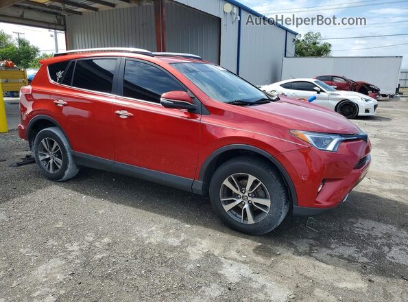 JTMWFREV9HJ142693 2017 TOYOTA RAV4 Red Front right