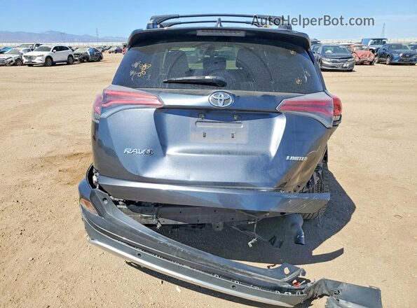 JTMYFREV3GD089558 2016 TOYOTA RAV4 Charcoal Հետևի տեսք