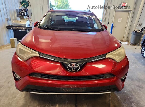 JTMYFREV3GJ070431 2016 TOYOTA RAV4 Red Widok z przodu