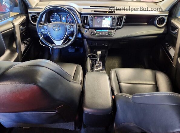 JTMYFREV3GJ070431 2016 TOYOTA RAV4 Red Widok deski rozdzielczej