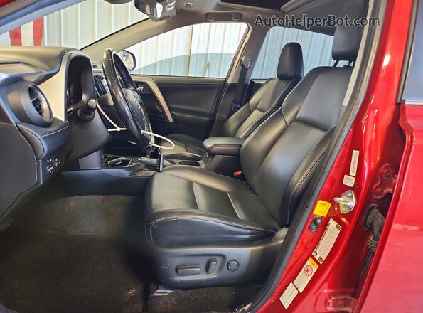 JTMYFREV3GJ070431 2016 TOYOTA RAV4 Red Widok wnętrza z przodu
