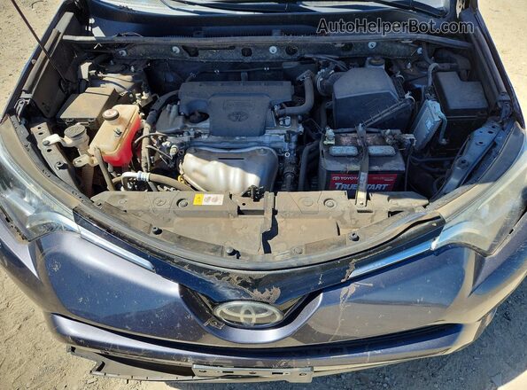 JTMZFREV1HJ103299 2017 TOYOTA RAV4 Серый Вид задней части салона