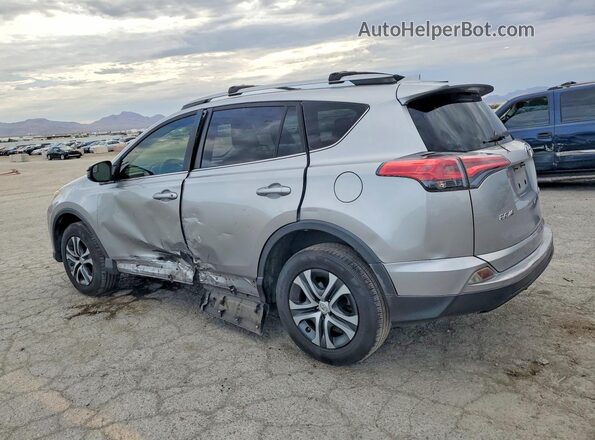 JTMZFREV2JJ210187 2018 TOYOTA RAV4 Silver Հետևի ձախ