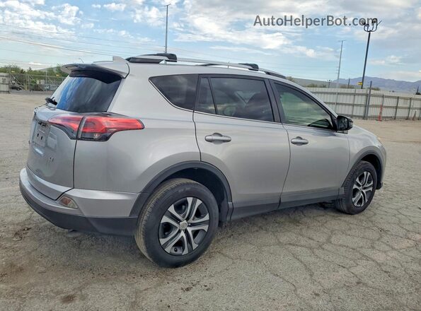 JTMZFREV2JJ210187 2018 TOYOTA RAV4 Silver Հետևի աջ