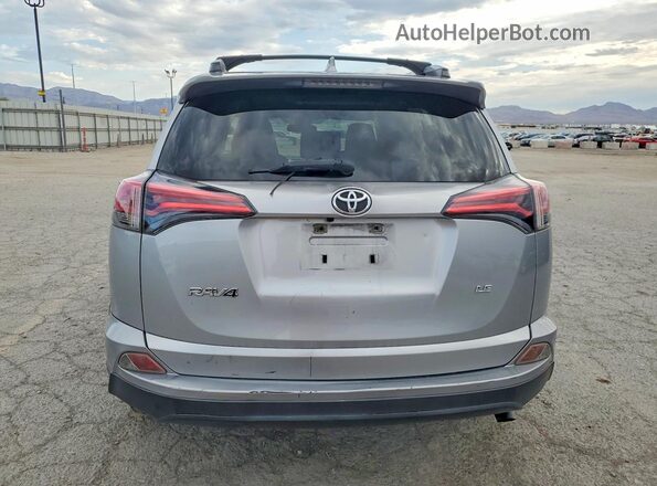 JTMZFREV2JJ210187 2018 TOYOTA RAV4 Silver Հետևի տեսք