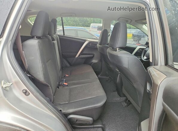 JTMZFREV3JJ187101 2018 TOYOTA RAV4 Silver Rear seats view