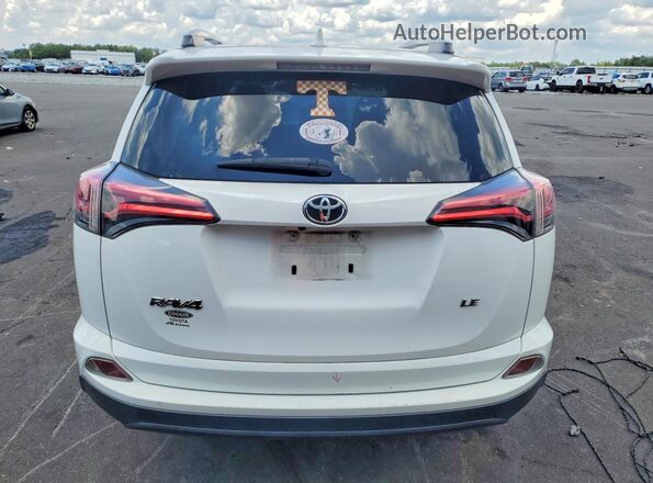 JTMZFREV4JJ150218 2018 TOYOTA RAV4 White Rear view