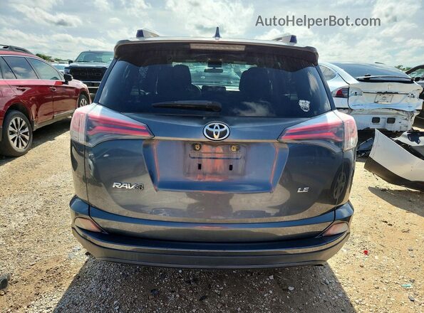 JTMZFREV6GD092183 2016 TOYOTA RAV4 Серый Вид сзади
