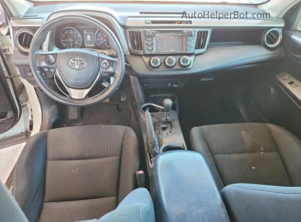 JTMZFREV7JJ732572 2018 TOYOTA RAV4 Белый Вид панели приборов
