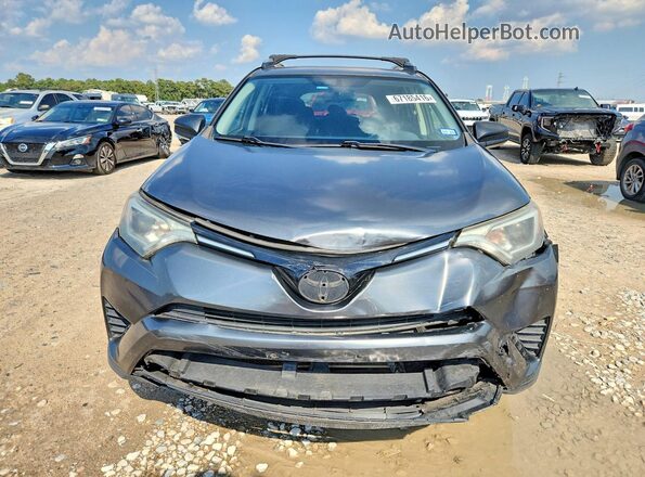 JTMZFREV8GD084067 2016 TOYOTA RAV4 Charcoal Vista frontal