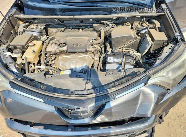 JTMZFREV8GD084067 2016 TOYOTA RAV4 Charcoal Vista del compartimento del motor