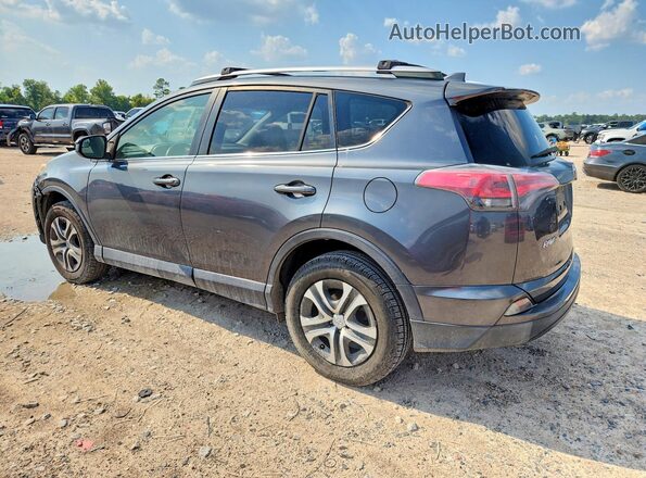 JTMZFREV8GD084067 2016 TOYOTA RAV4 Charcoal Trasero izquierdo