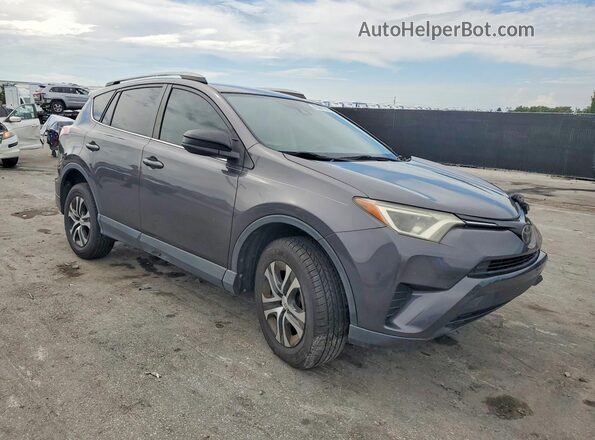 JTMZFREVXJJ160249 2018 TOYOTA RAV4 Gray Front right