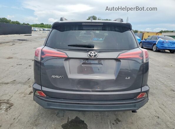 JTMZFREVXJJ160249 2018 TOYOTA RAV4 Gray Rear view