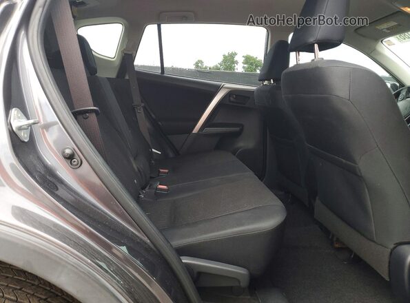 JTMZFREVXJJ160249 2018 TOYOTA RAV4 Gray Rear interior view