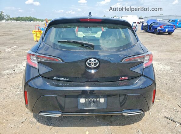 JTNK4RBE6K3024701 2019 TOYOTA COROLLA Black Rear view