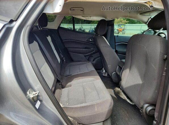 KL77LFE28RC159246 2024 CHEVROLET TRAX Silver Rear interior view