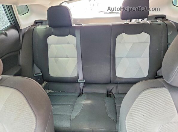 KL77LFE28RC159246 2024 CHEVROLET TRAX Silver Rear seats view