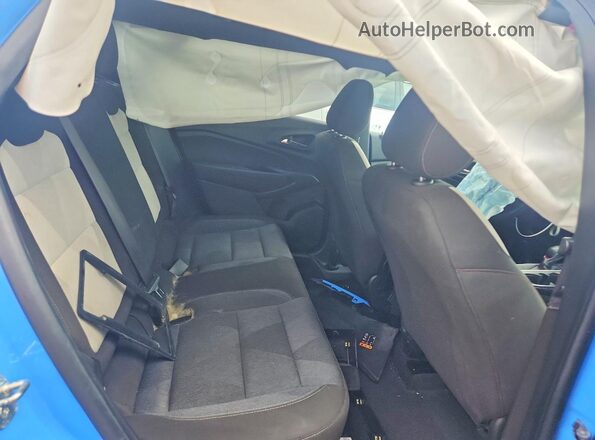 KL77LGE24RC082042 2024 CHEVROLET TRAX Синий Вид задней части салона