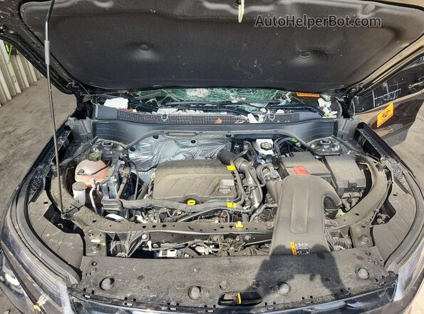 KL77LGEP9SC219946 2025 CHEVROLET TRAX Black Вид задньої частини салону