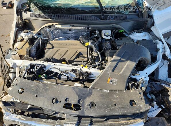 KL77LHEP2TC037934 2026 CHEVROLET TRAX White Vista interior trasera