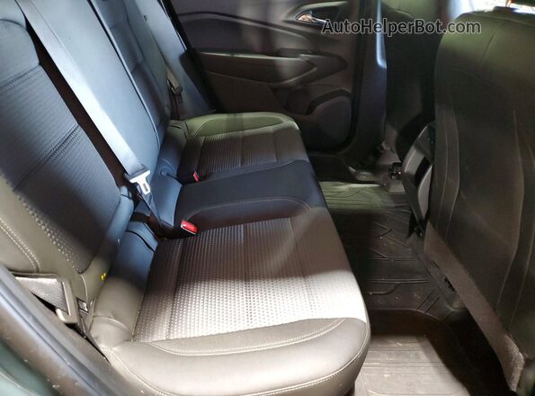 KL77LHEP4SC074093 2025 CHEVROLET TRAX Gray Vista interior trasera