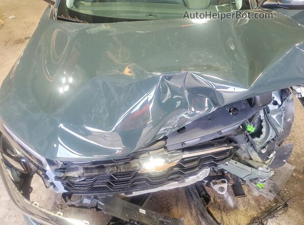 KL77LHEP4SC074093 2025 CHEVROLET TRAX Gray Vista del compartimento del motor