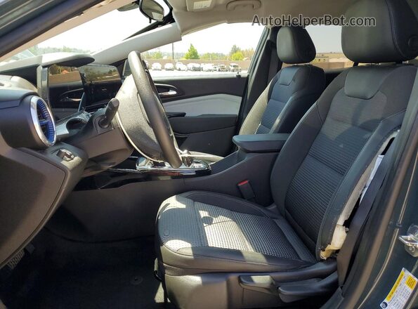 KL77LHEP5SC034234 2025 CHEVROLET TRAX Зеленый Вид салона спереди
