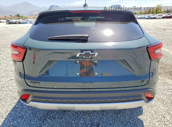 KL77LHEP5SC034234 2025 CHEVROLET TRAX Зеленый Вид сзади