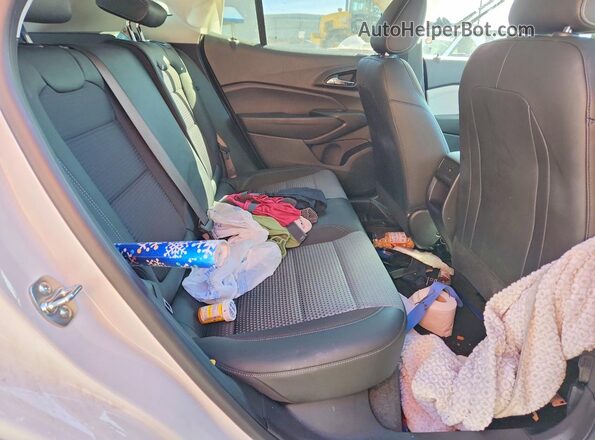 KL77LHEP5SC236331 2025 CHEVROLET TRAX White Vista interior trasera