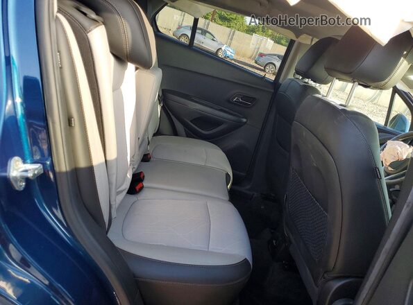 KL7CJPSBXLB330865 2020 CHEVROLET TRAX Синий Вид задней части салона