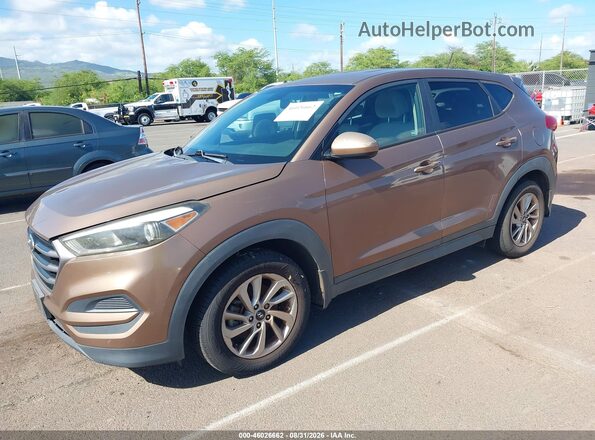 KM8J23A42GU098917 2016 HYUNDAI TUCSON Коричневый Передняя левая четверть