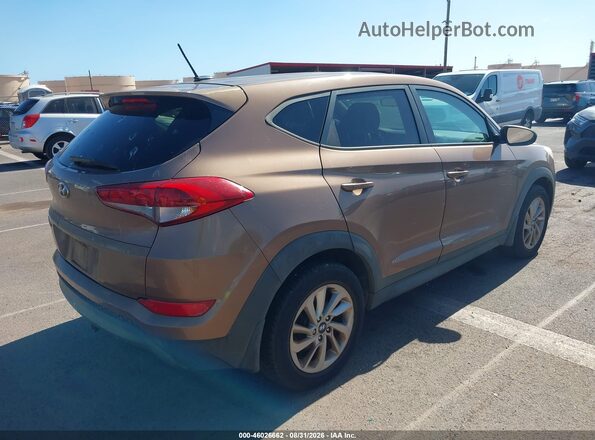 KM8J23A42GU098917 2016 HYUNDAI TUCSON Коричневый Задняя правая четверть