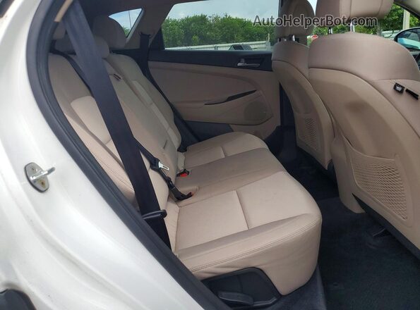 KM8J23A42HU580451 2017 HYUNDAI TUCSON White Rear interior view