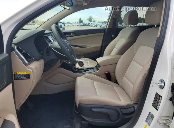 KM8J23A42HU580451 2017 HYUNDAI TUCSON White Front interior view