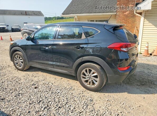 KM8J23A43GU040038 2016 HYUNDAI TUCSON Black Trasero izquierdo