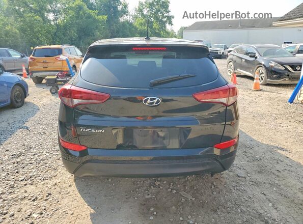 KM8J23A43GU040038 2016 HYUNDAI TUCSON Black Vista trasera