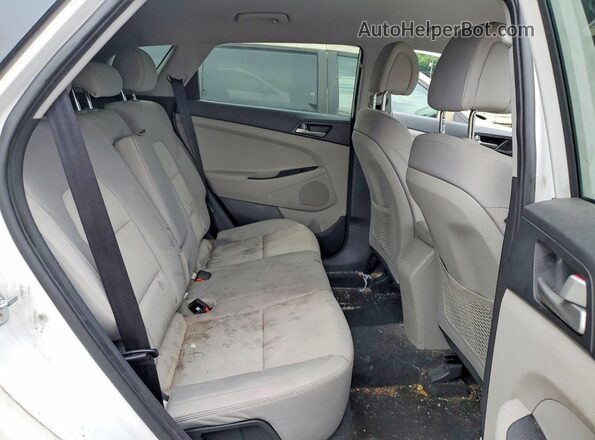 KM8J2CA44JU809346 2018 HYUNDAI TUCSON White Rear interior view
